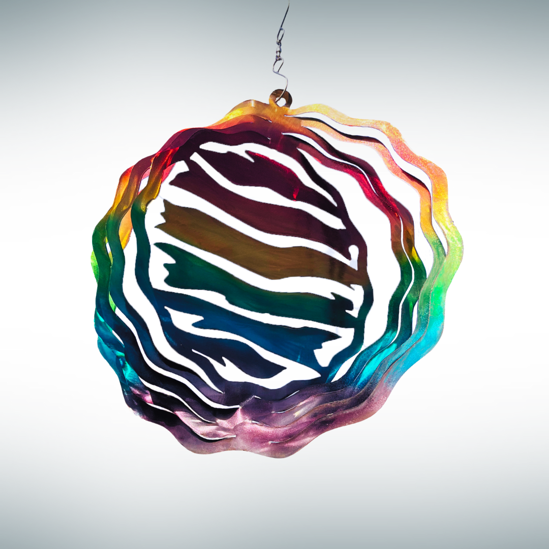 Metal Cut Plasma CNC design that spins in the wind, painted with red, orange, yellow, green, blue, purple, with a hook that allows for spinning 