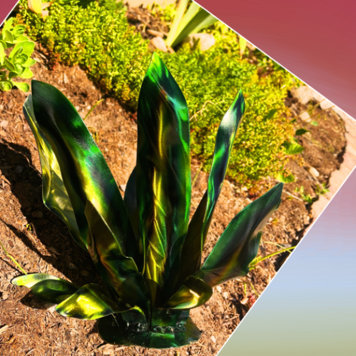 Green, Yellow, Gold, Metal garden art agave, in a garden. 