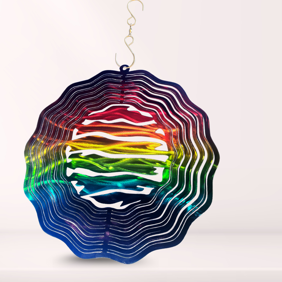 Rainbow Colored Steel Wind Spinner for LGBT pride flag representation. Displayed with a hook at the top for 360 degree rotation when the wind catches the rings. Metal art gay pride flag colors